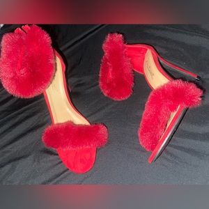 Red furry heels